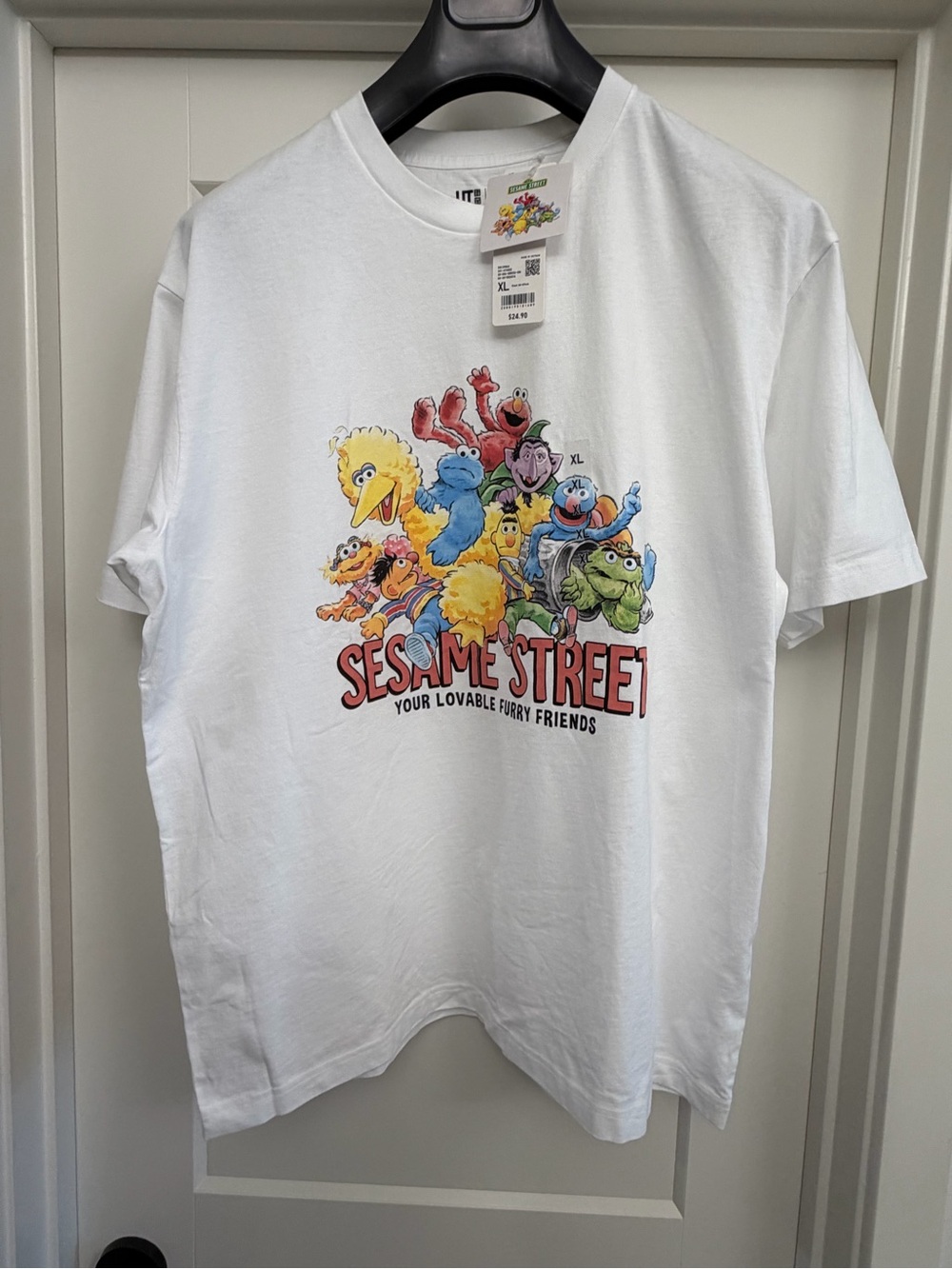 Uniqlo White Sesame Street Graphic Tee with Colorful Characters